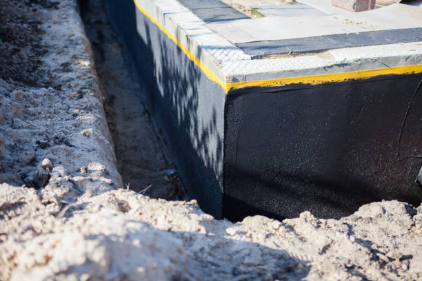 Professional Waterproofing technician working in Williams, IN